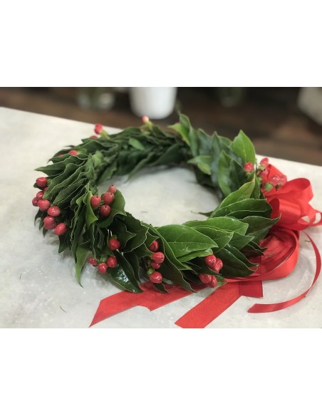 coroncina di laurea con bacche rosse